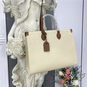 Louis Vuitton Onthego GM Monogram Empreinte Leather Beige