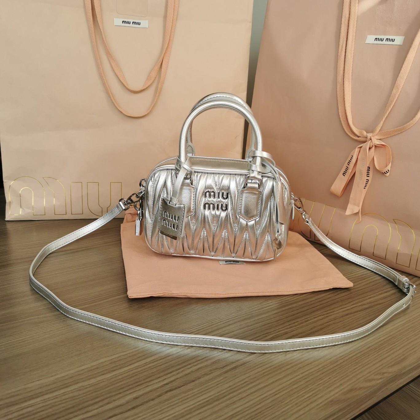 MIUMIU HANDBAG silver color