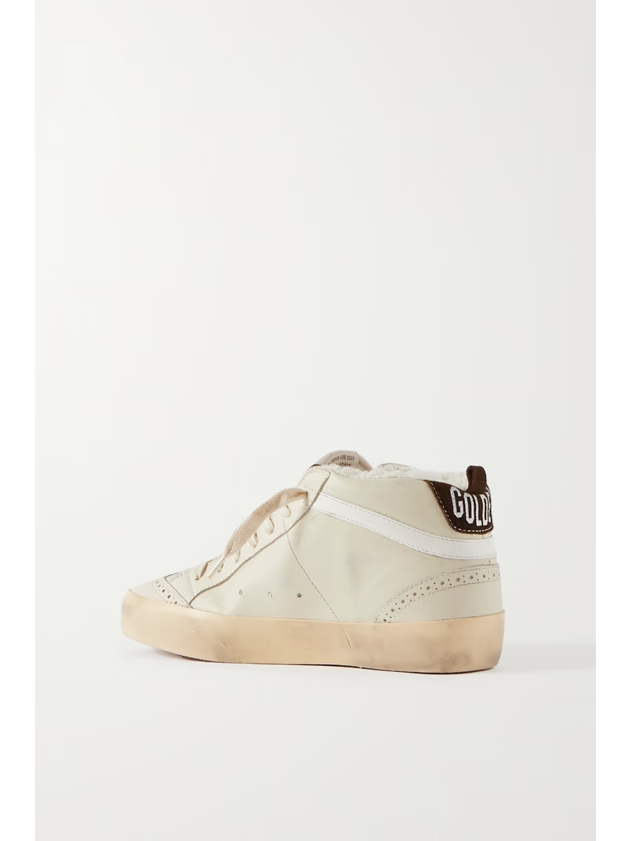 Superstar distressed shearling-lined rubber and leather sneakers