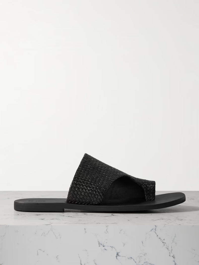 Asymmetric woven leather slides