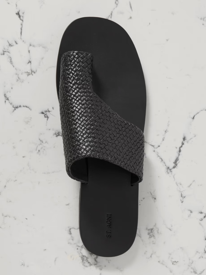 Asymmetric woven leather slides