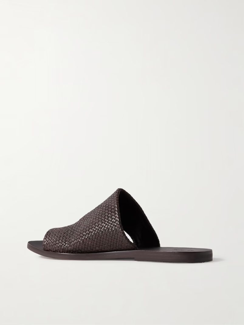 Asymmetric woven leather slides