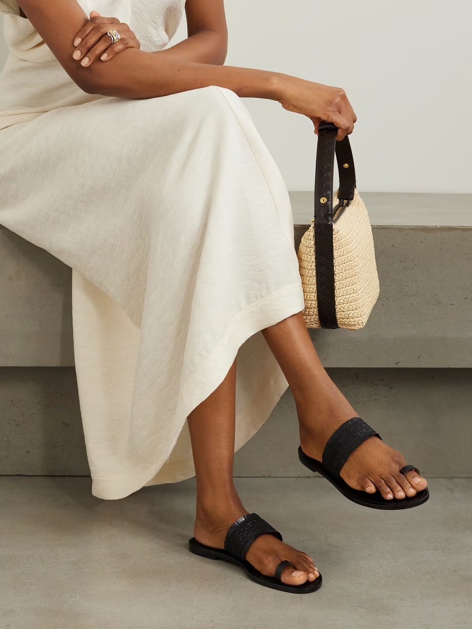 The Shela fringed braided leather slides