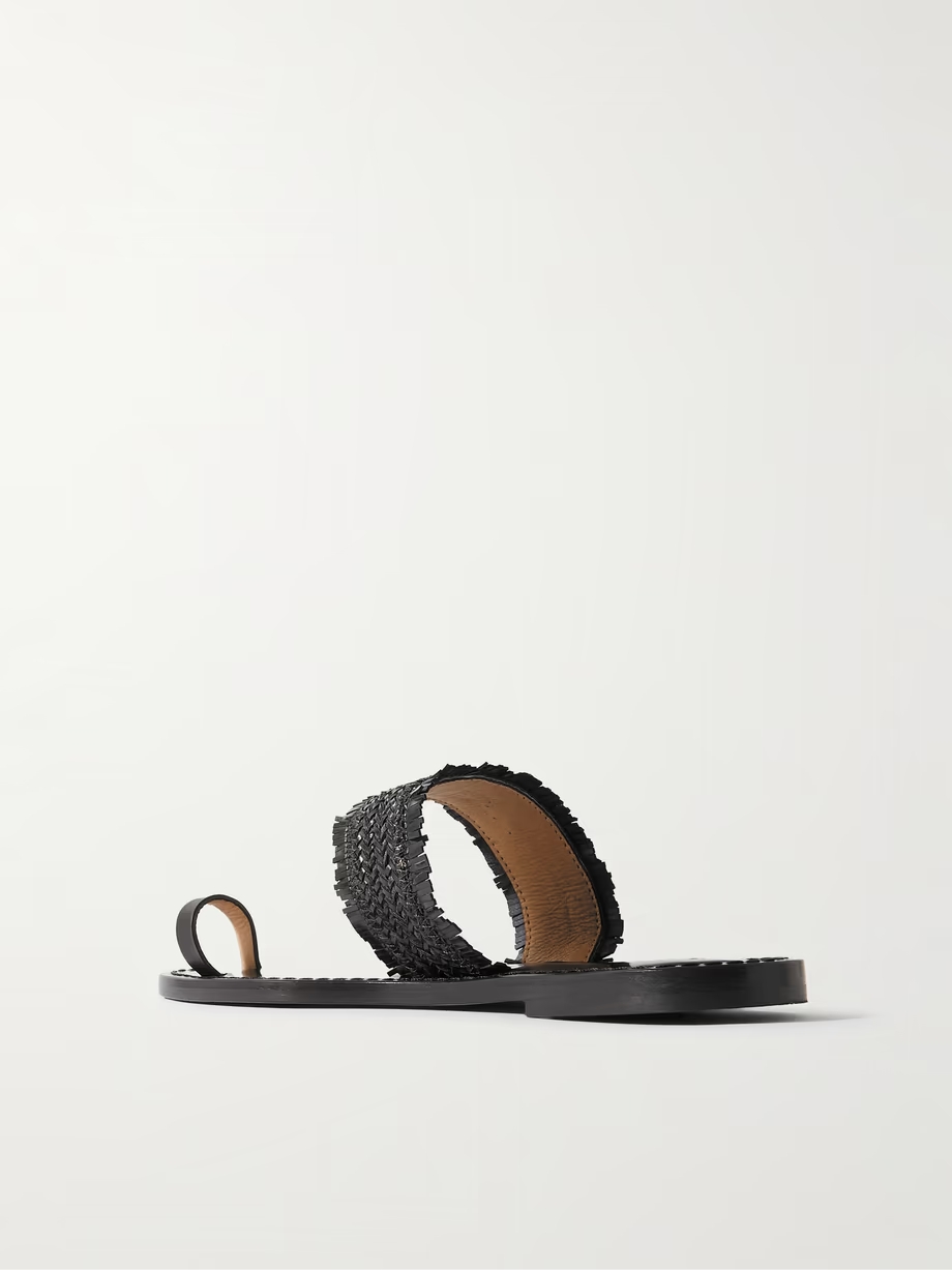 The Shela fringed braided leather slides