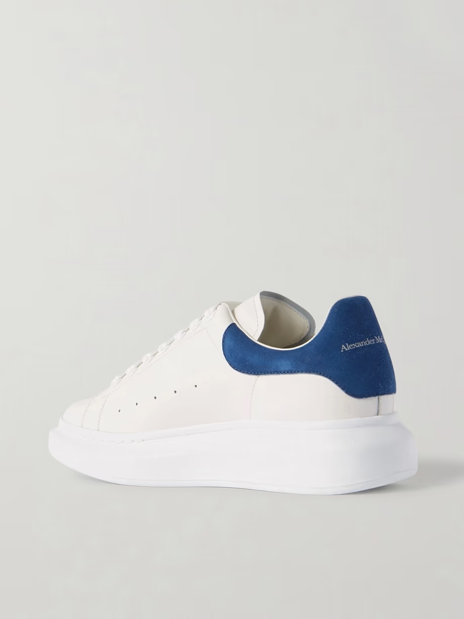 Suede-trimmed leather exaggerated-sole sneakers