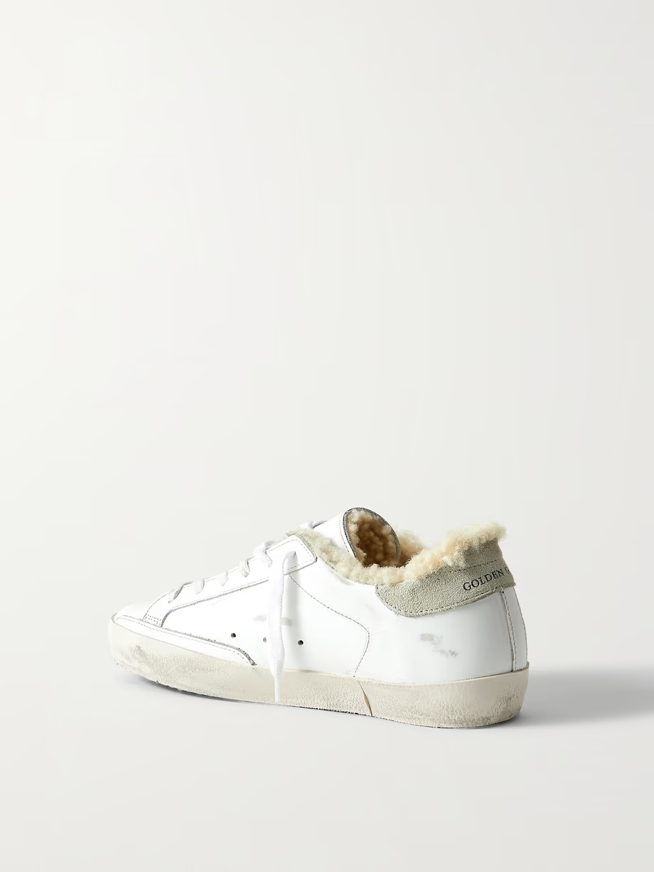 Superstar shearling-lined distressed glittered leather sneakers