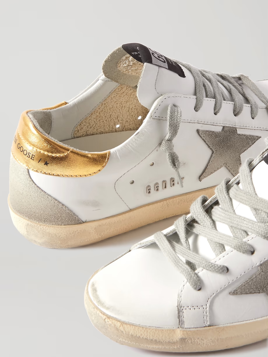 Superstar distressed leather and suede sneakers